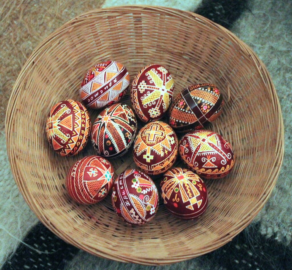 A basket full of geometrically patterned pysanky